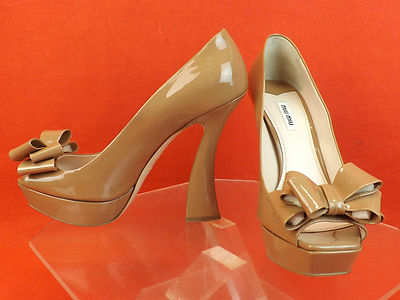 Pre-owned Prada Miu Miu  Caramel Patent Leather Bow Flared Heel Platform Pumps 41 In Nude/caramel