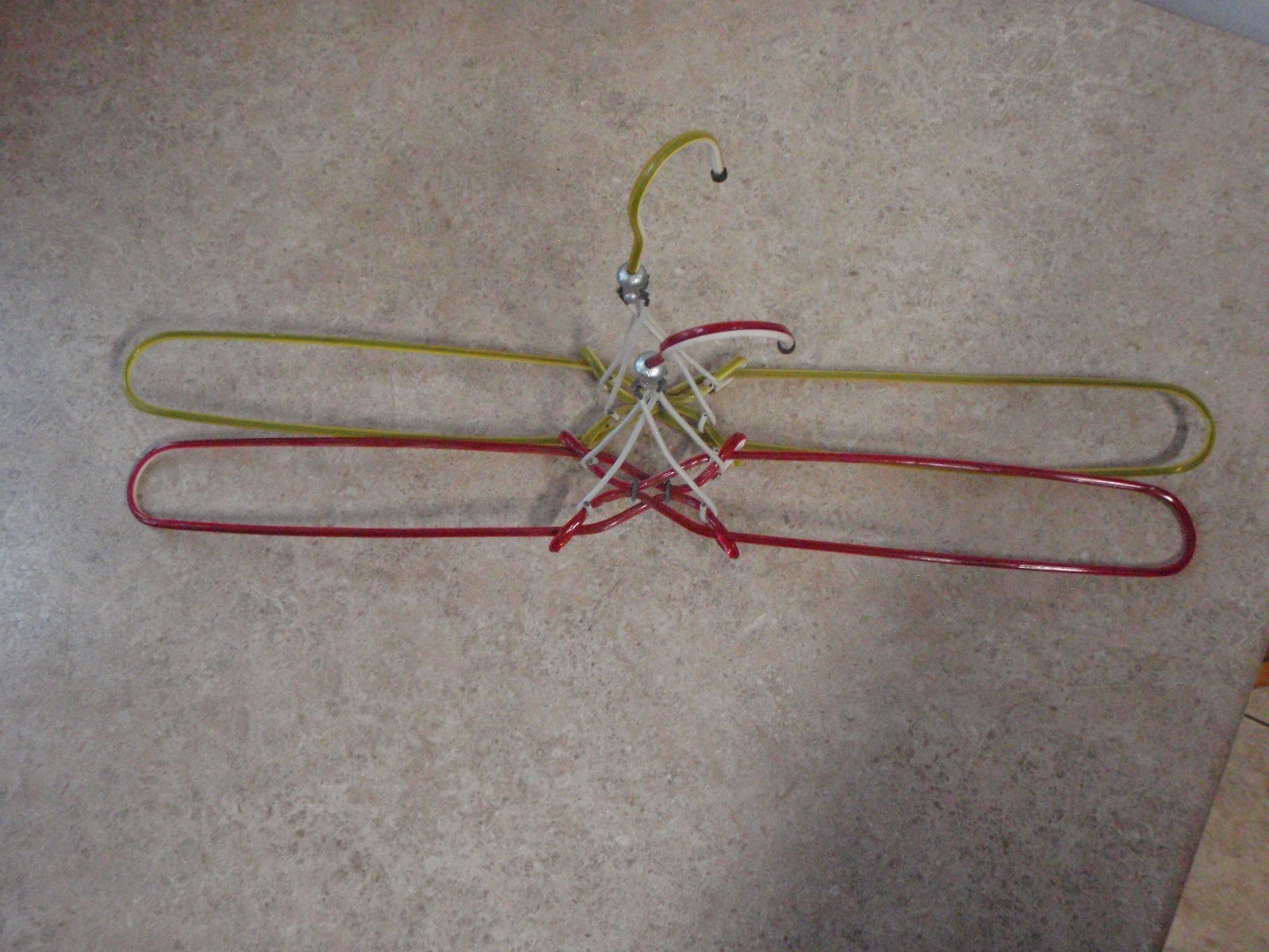 2 Rare Vintage Clothes Hangers Vinyl Covered Wire Folding Adjustable Unusual Lot