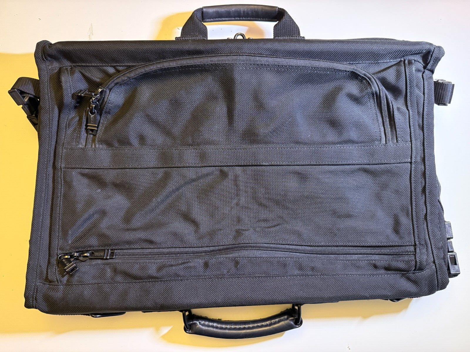 Black TUMI Tri-Fold Alpha Carry On Garment Bag Model No