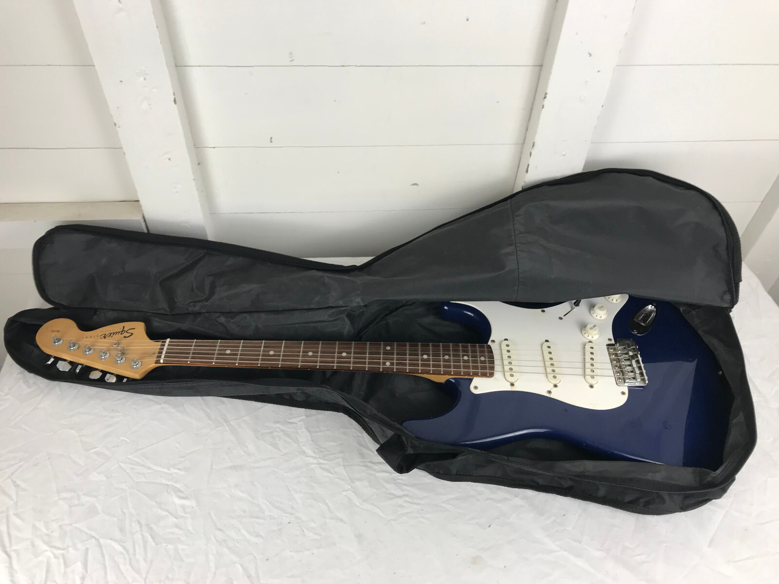 Fender Squier Stratocaster Electric Guitar w/ Gig Bag. Dark Fender Squier Stratocaster Electric Guitar w/ Gig Bag. Dark