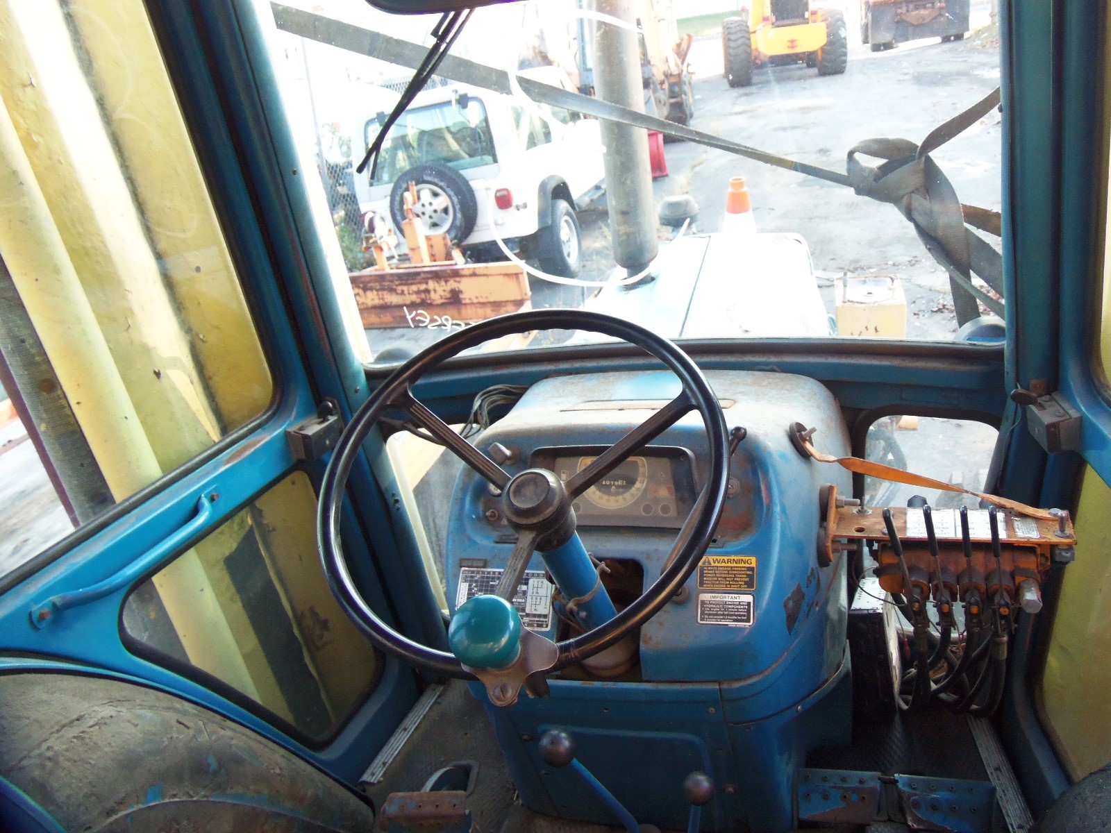 L@@k FORD 6610 TRACTOR WITH THREE MOTT MOWERS AND AC