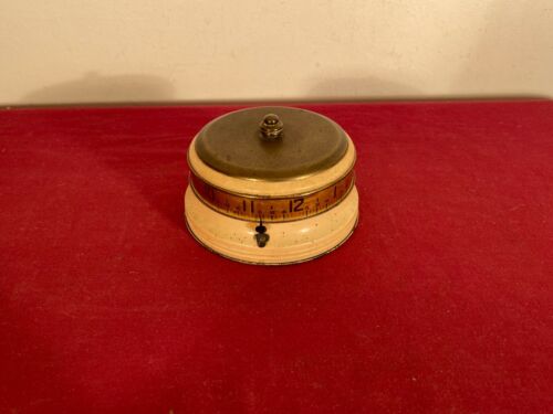 Vintage Lux mystery Rotary tape measure clock