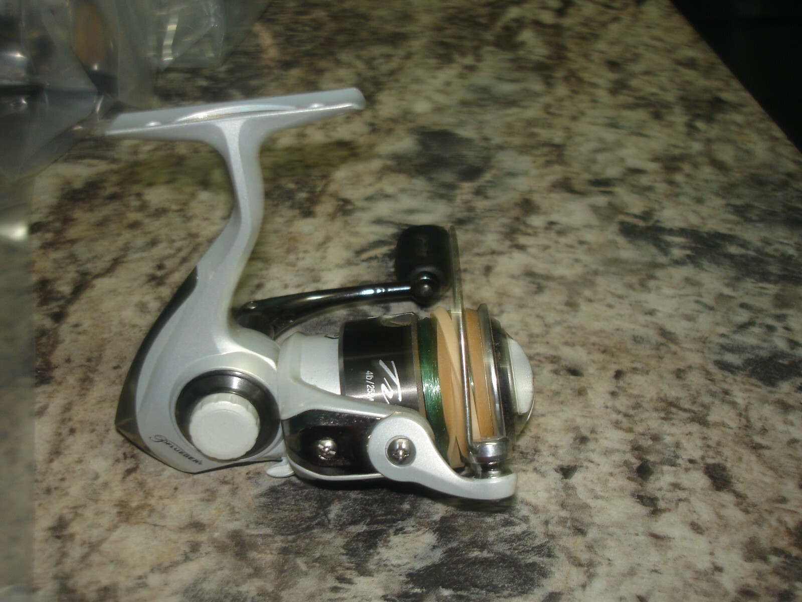 Pflueger Trion TR 130 spinning  fishing reel WORKS