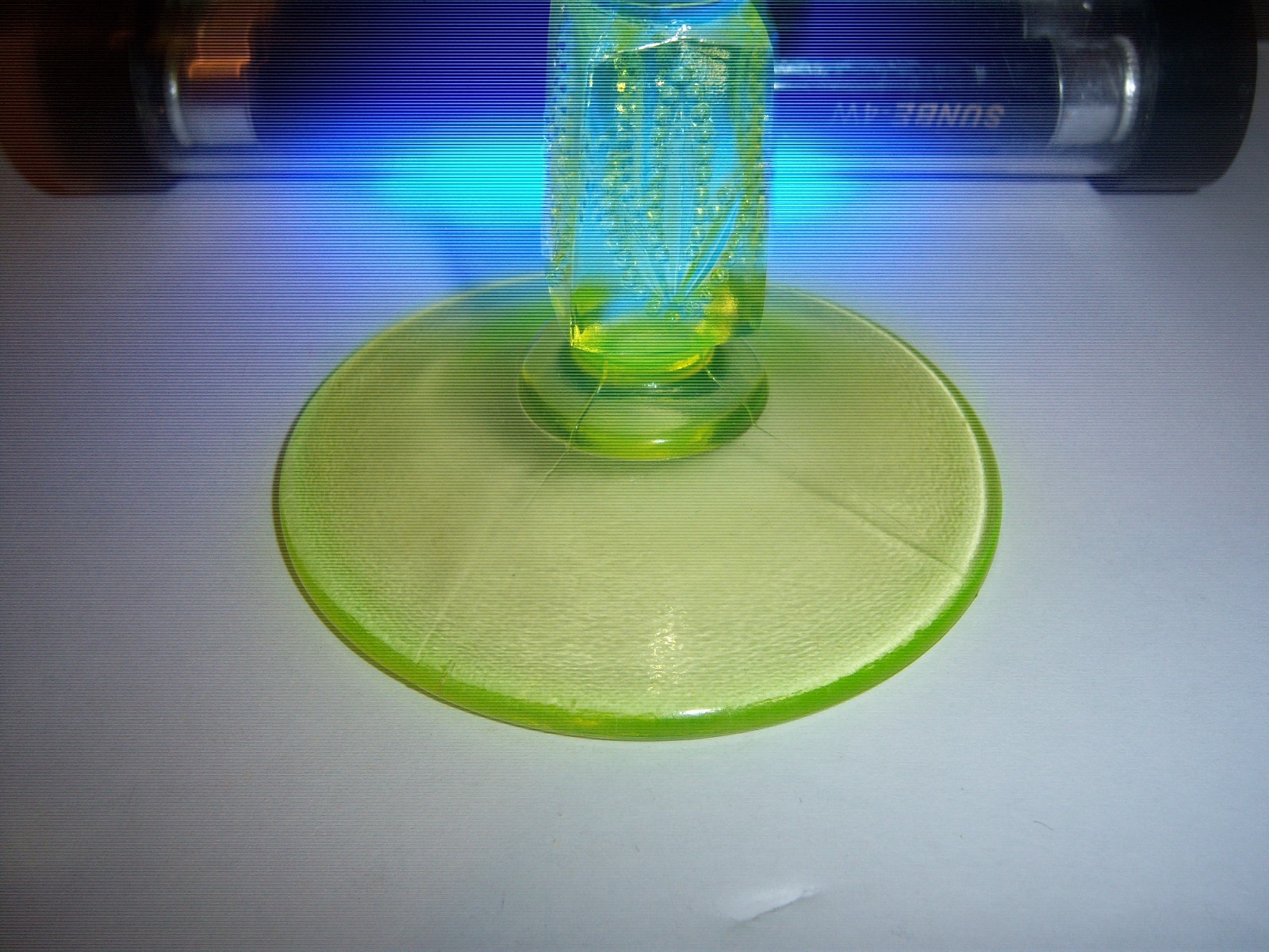 ...FOOTED GREEN VASELINE GLASS CANDY DISH W/OPALESCENT AROUND TOP
