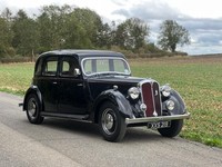 1948 Rover 12 saloon, black with red leather interior.
