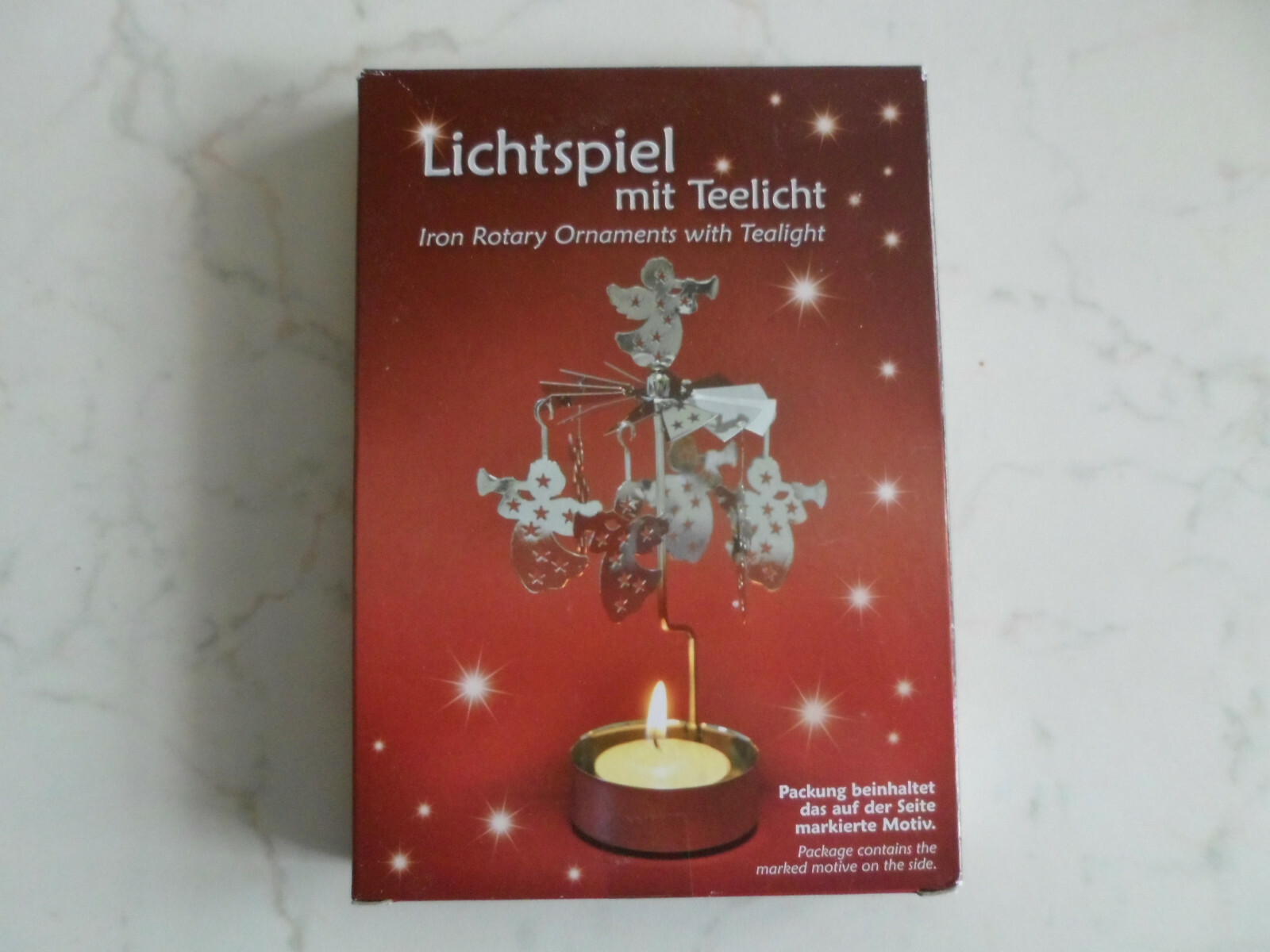 Lichtspiel mit Teelicht Pyramide Engel