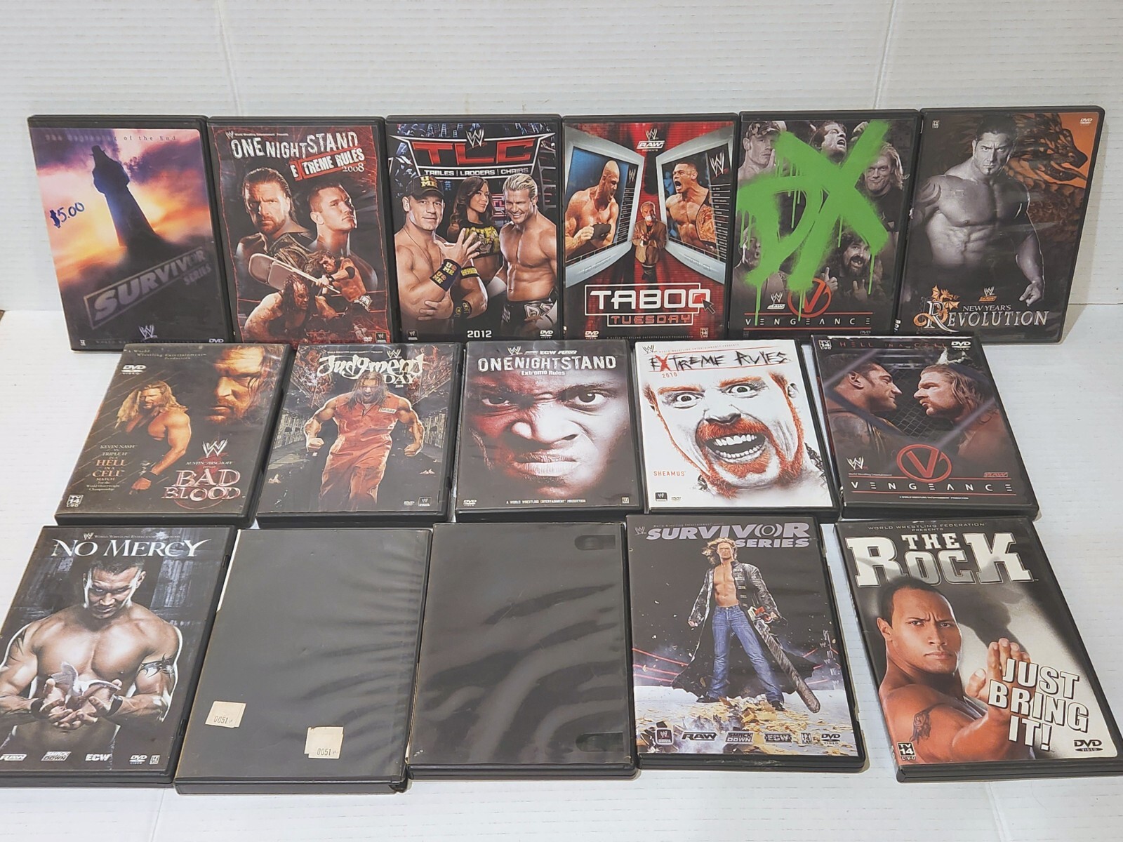 Lot of 16 WWE DVDs 2007 - 2013 ~ Rock ~ Extreme Rules ~ TLC Lot of 16 WWE DVDs 2007 - 2013 ~ Rock ~ Extreme Rules ~ TLC