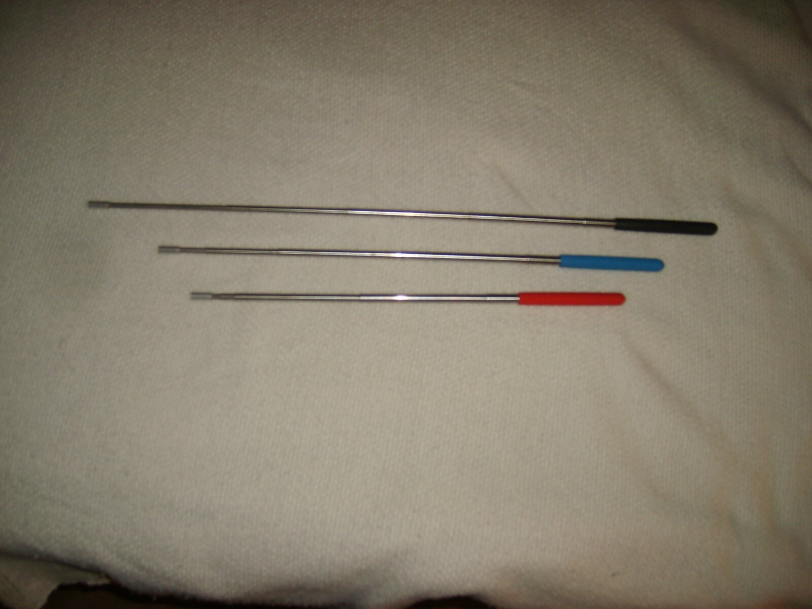 TELESCOPIC HANDLE TELESCOPING VARIOUS  COLORS RUBBER HANDLE APPROX 7