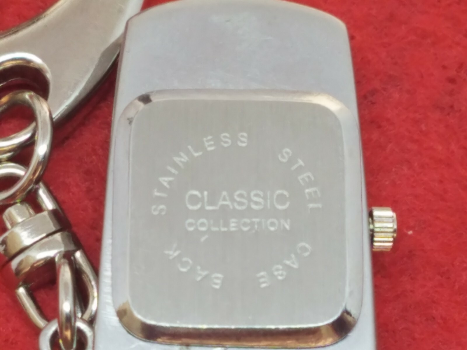 VINTAGE CELL FLIP PHONE WATCH SILVER MOTOROLA DESIGN WORKING ORDER NEW BATTERY