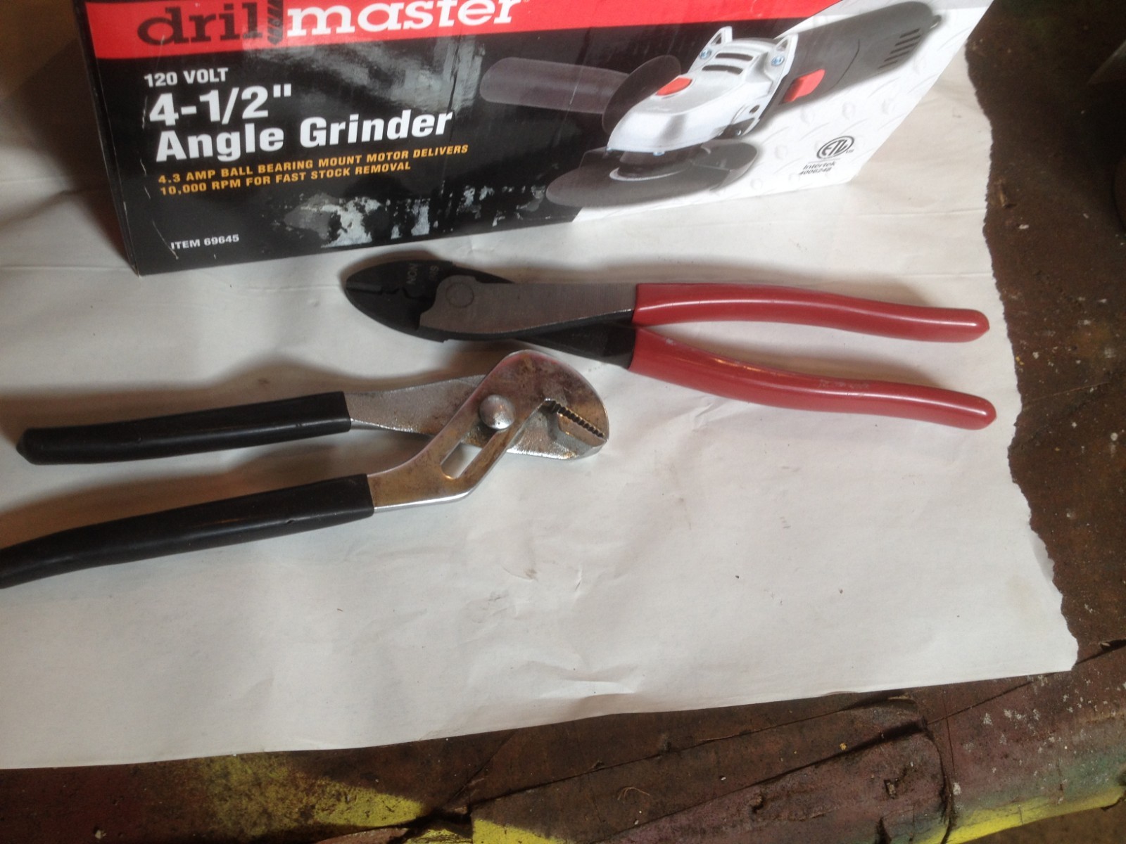 Drill master 4 1/2 angle grinder with extra hand tools included.