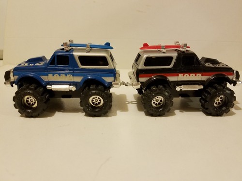 VINTAGE SCHAPER STOMPER 4X4 FORD BRONCO X 2 WITH BRONCO ON THE WINDSHIELD. RARE!