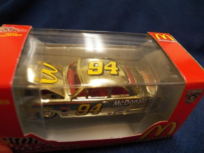 RACING CHAMPIONS NO 94 MCDONALDS GOLD FORD TAURUS  NIB