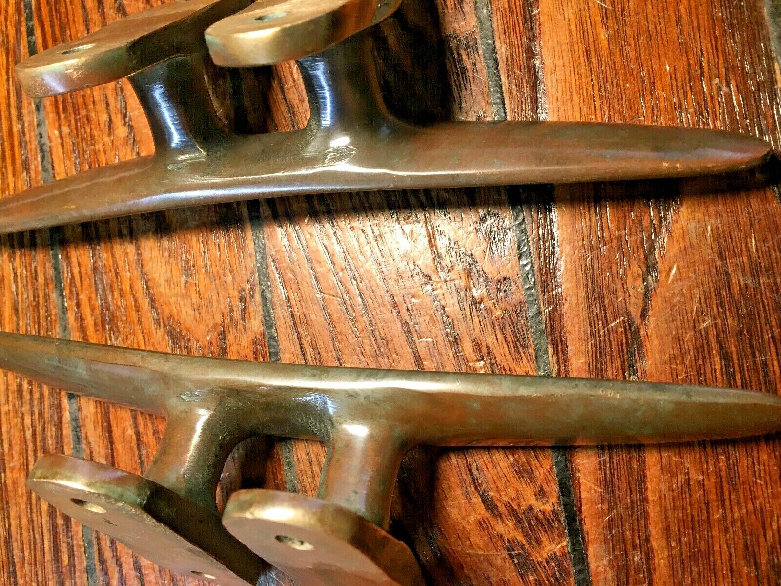 PAIR OF VINTAGE SOLID BRONZE CLEATS 8