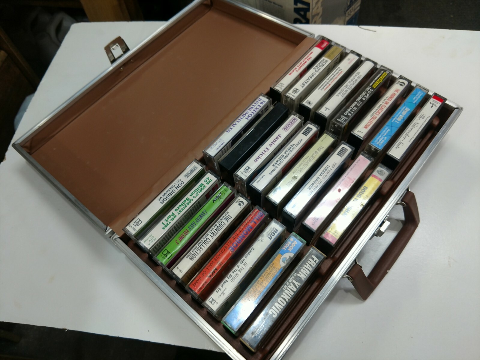 24 Cassette Carrying Case Briefcase with 24 Misc. Cassettes Country Polka Mozart