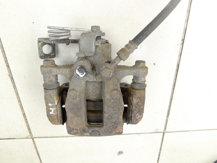 Kia Rio III UB 15-17 CVVT 1,4 80KW Bremssattel Bremszange Hinten Links Kia Rio III UB 15-17 21.05.2015 58300-1W350... Vorschau 3