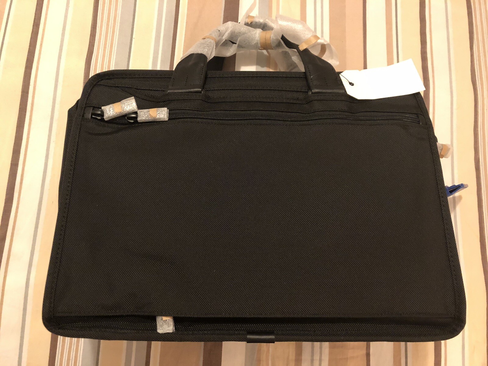 tumi alpha 2 expandable organizer laptop brief