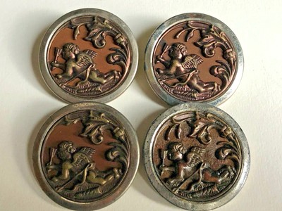 1 cupid button in painted enamels 1 and a half inch by 2 inch.