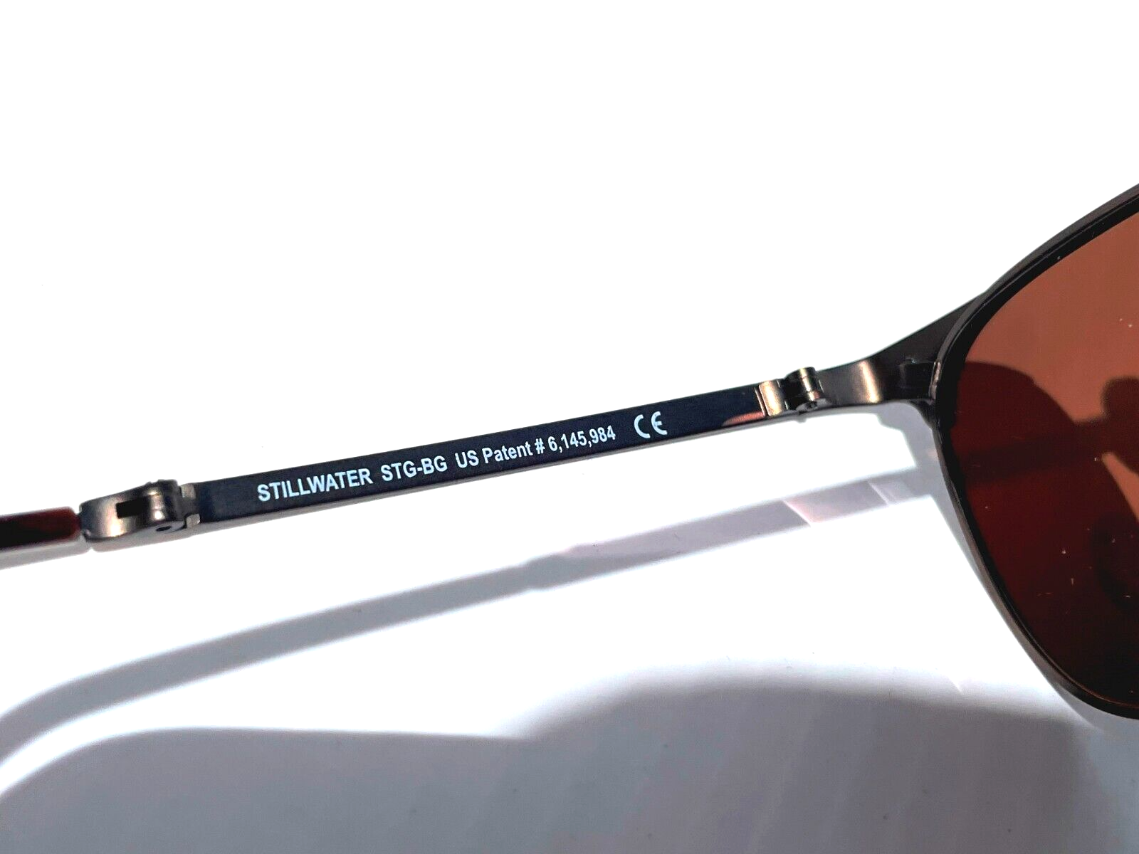 Pre-owned Maui Jim Stillwater Gold Engraved Polarized Bronze Folding Sunglass H706-16c In Brown
