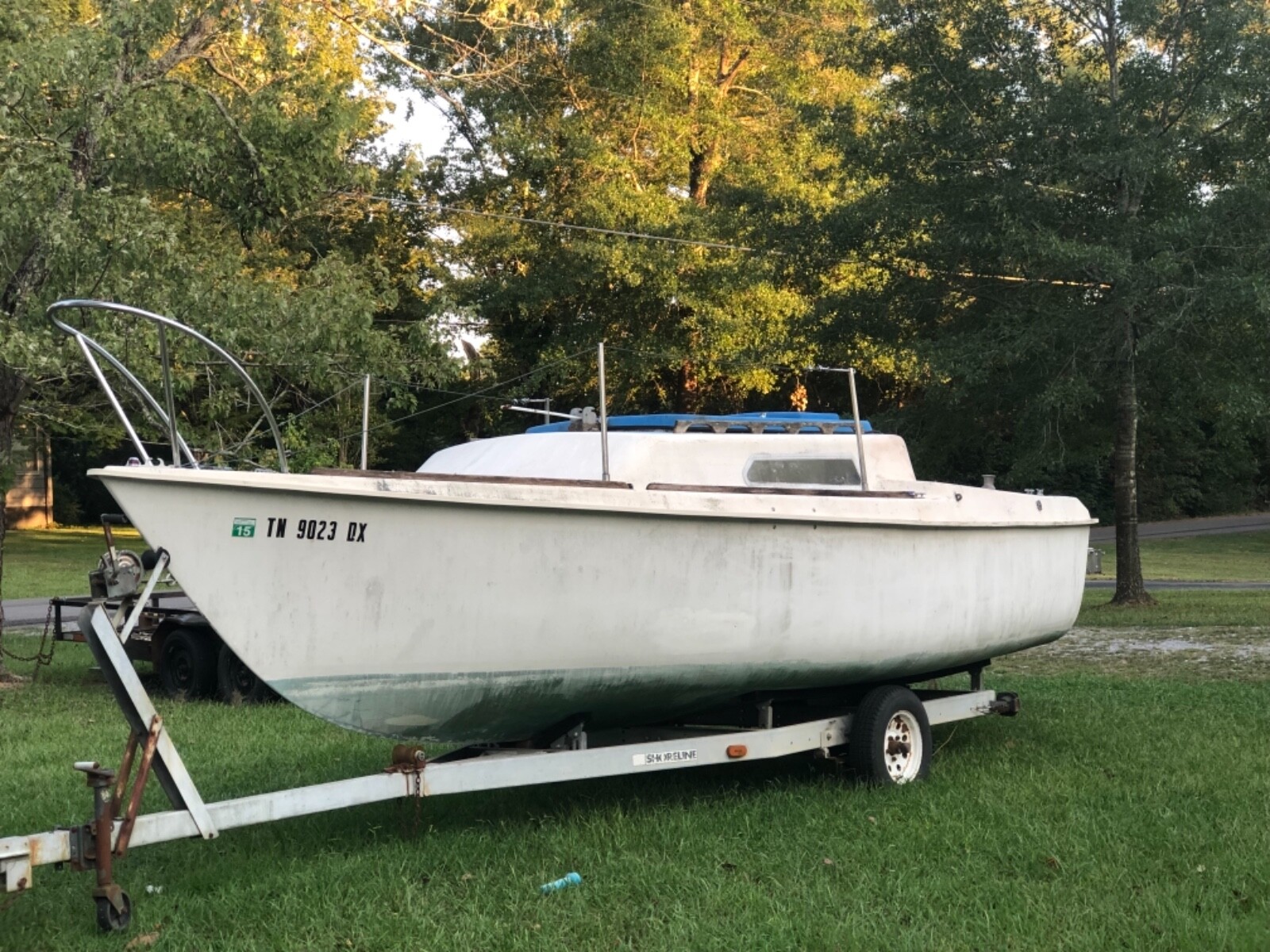 23' Kells Sailboat with pop up Top and Trailer