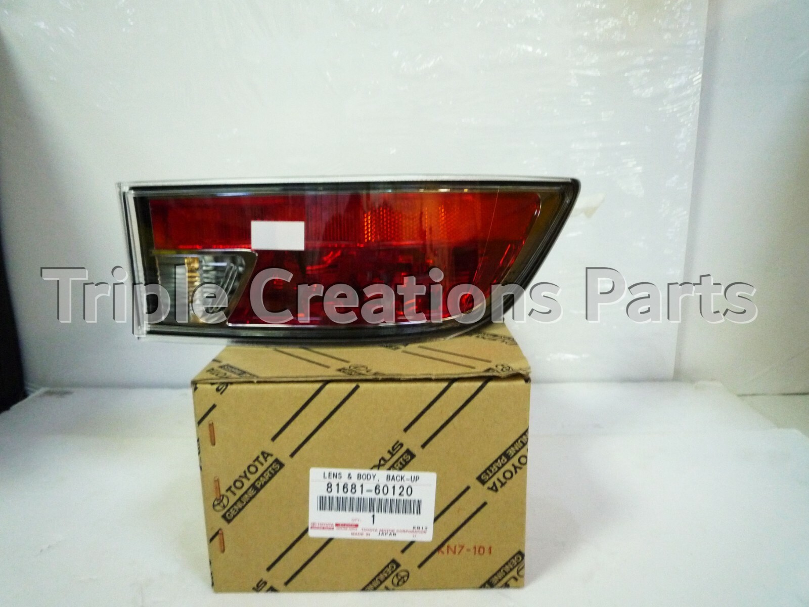 GENUINE Toyota 81681-60120 LENS & BODY, BACK-UP LAMP, LH