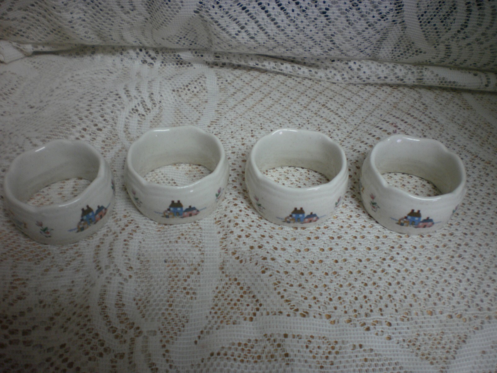 4 International China Heartland Embossed Stoneware Napkin Rings Colonial Houses