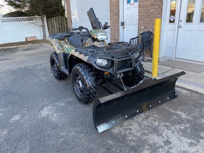 CAMO POLARIS SPORTSMAN 850 HO, POLARIS WINCH, GUN RACK, BRAND NEW PLOW, BOX