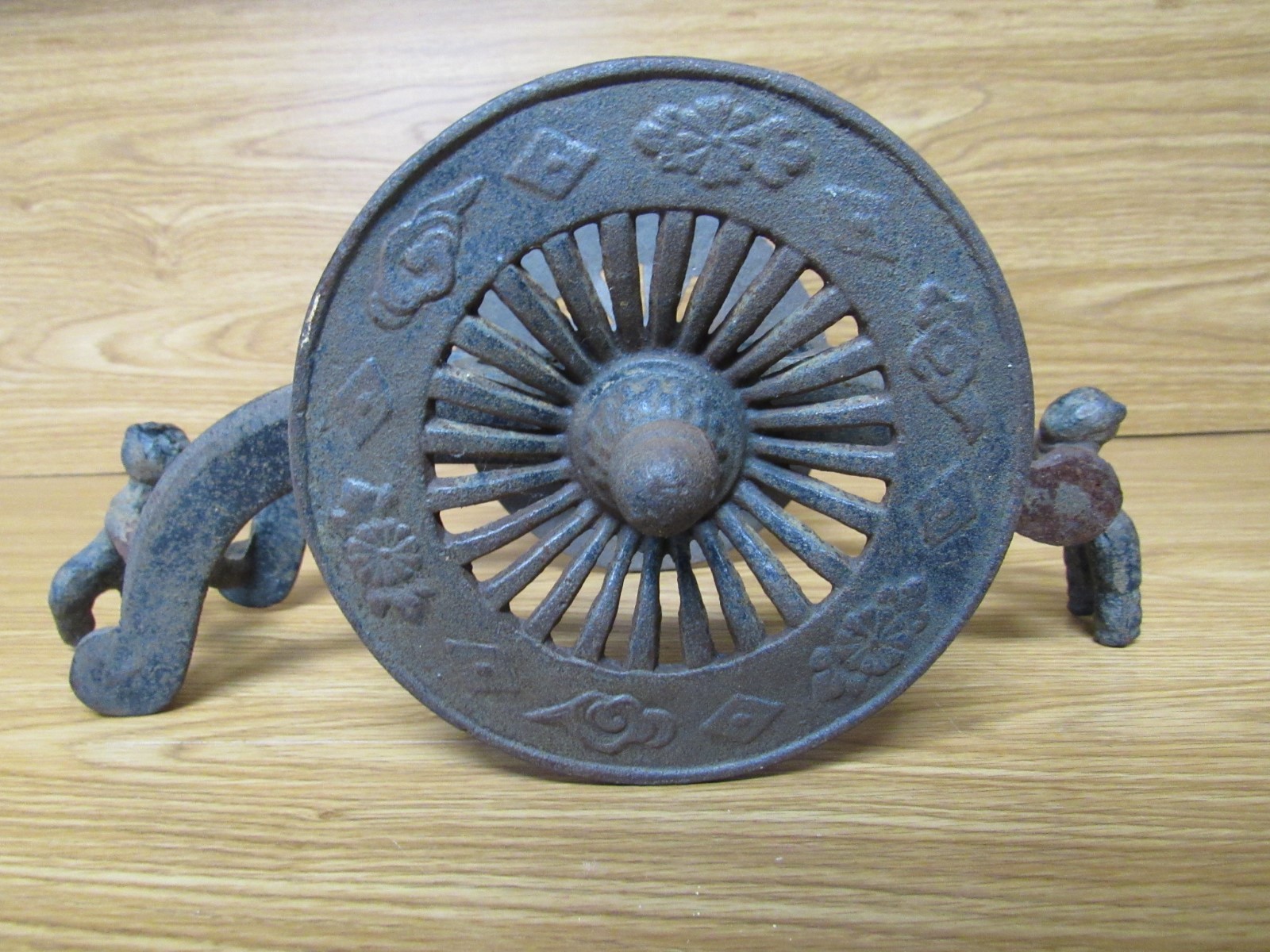 Antique Vintage Cast Iron Primitive-Two Men Pushing Wheels