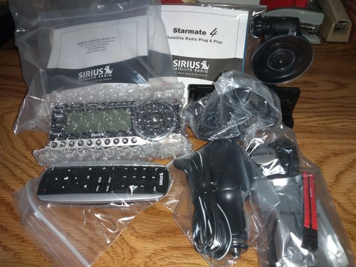 SIRIUS SATELLITE RADIO PLUG N PLAY WITH CASE. FACTORY RECONDITIONED IN BOX