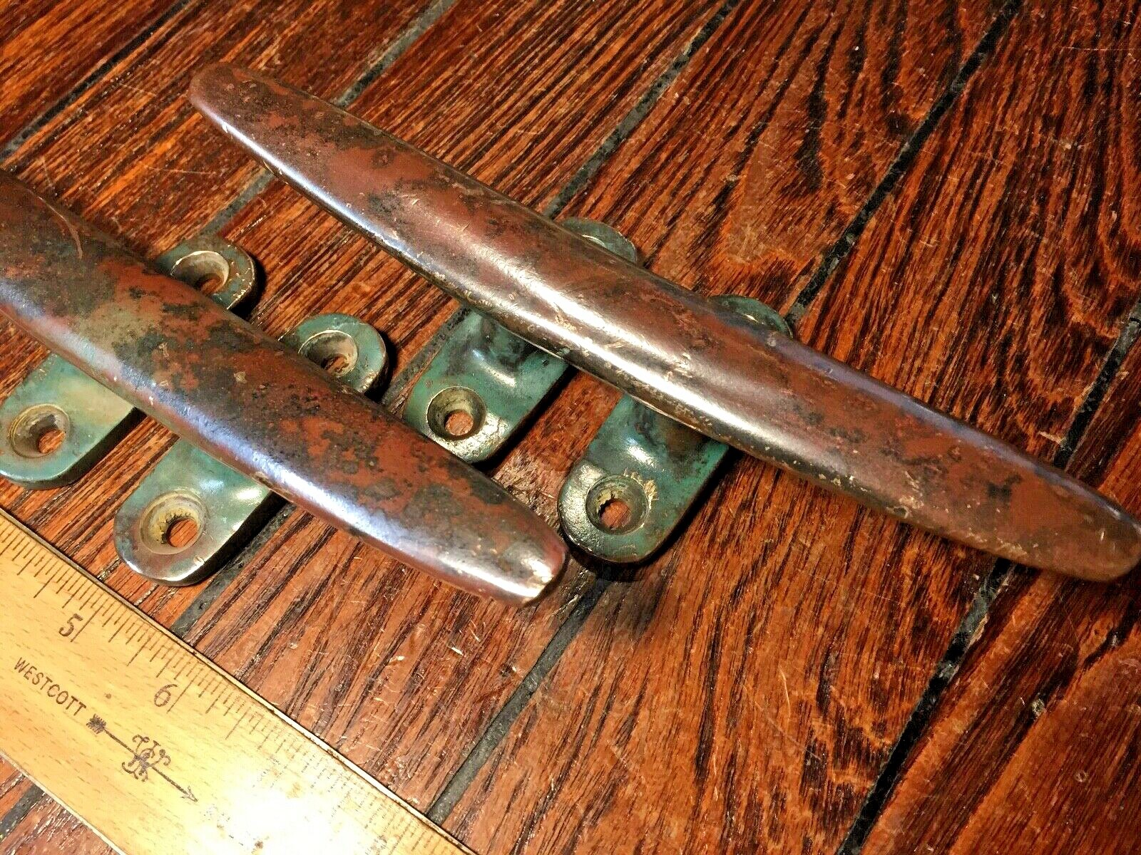 PAIR OF VINTAGE SOLID BRONZE CLEATS 8