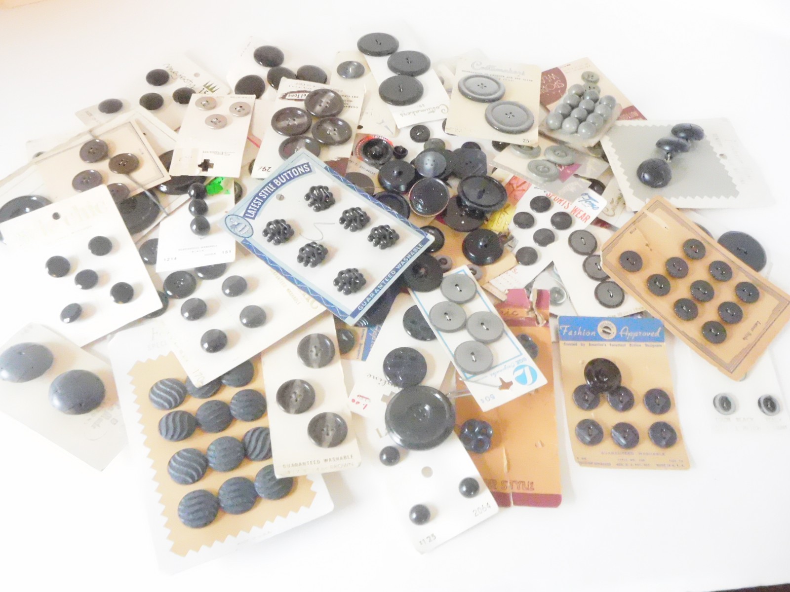 VINTAGE NEW UNUSED LOT OF 100+  GREY TO BLUES ASST. BUTTONS - MOST ON CARDS