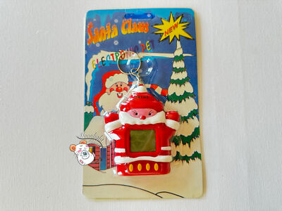 24 in 1 Red Santa Claus Virtual Pet Tamagotchi 1997 (US Seller)