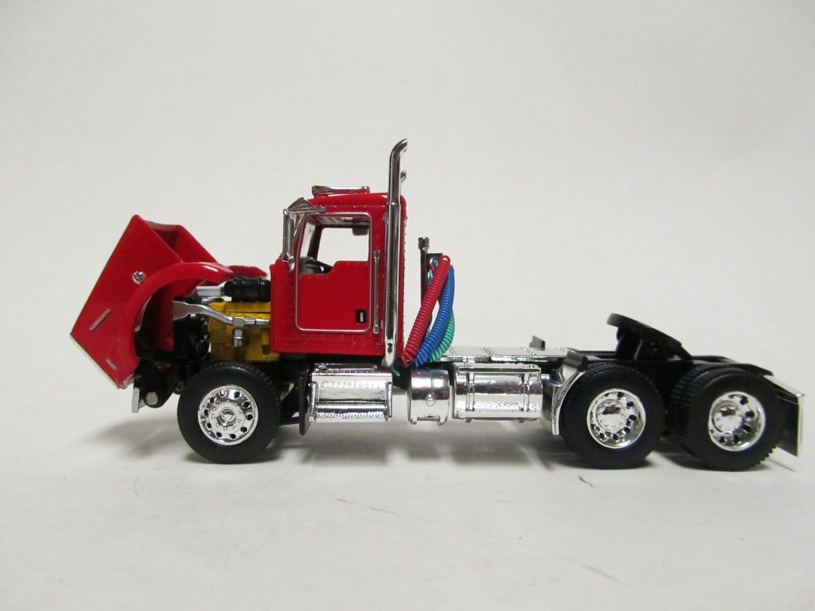 DCP / FIRST GEAR 1/64 SCALE T-800 KENWORTH DAY CAB RED & CHROME, BLACK FRAME  3