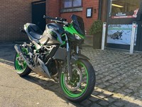 Brand new Kawasaki Z500 SE naked A2 motorcycle in Green - extras fitted! 
