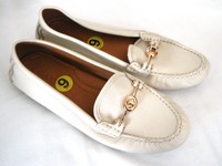 coach moccasin flats