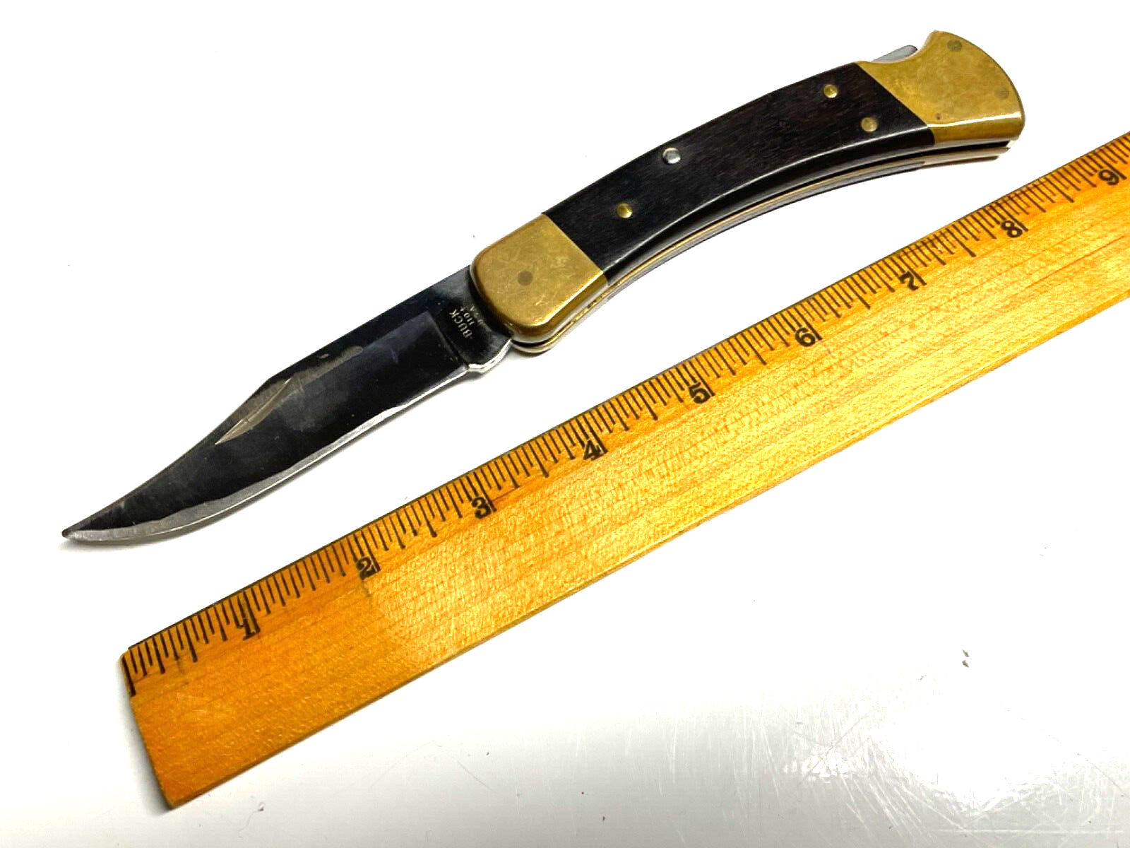 Buck 110 USA Wood Brass 1991 Single Blade Locking Knife