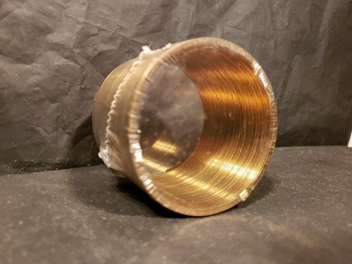 Vintage sealed nib Gold/brass anniversary Slinky Toy in Felt Box.