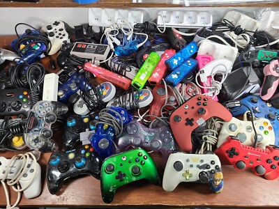 Huge Lot of Mixed 3rd Party Gaming Controllers + Charging Station 25lbs Untested