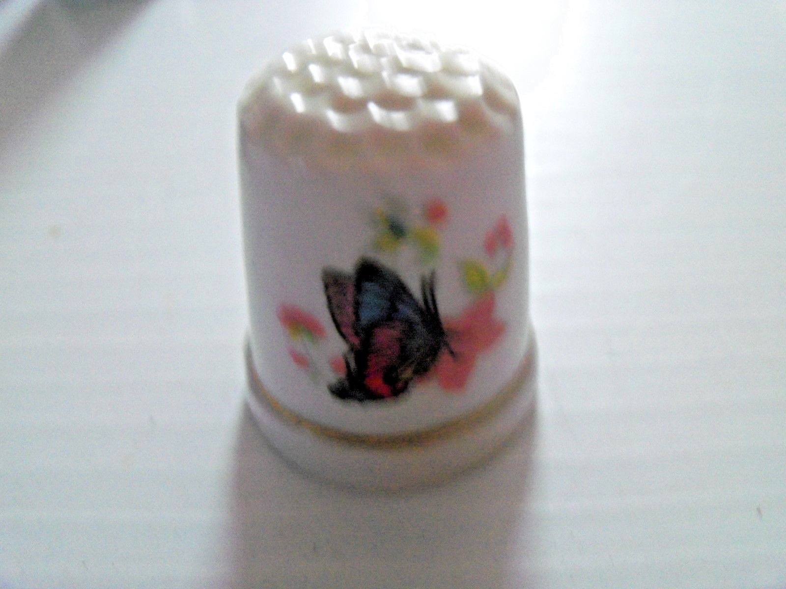 Lot of 7 Porcelain Thimble with Butterfly Pictured On It