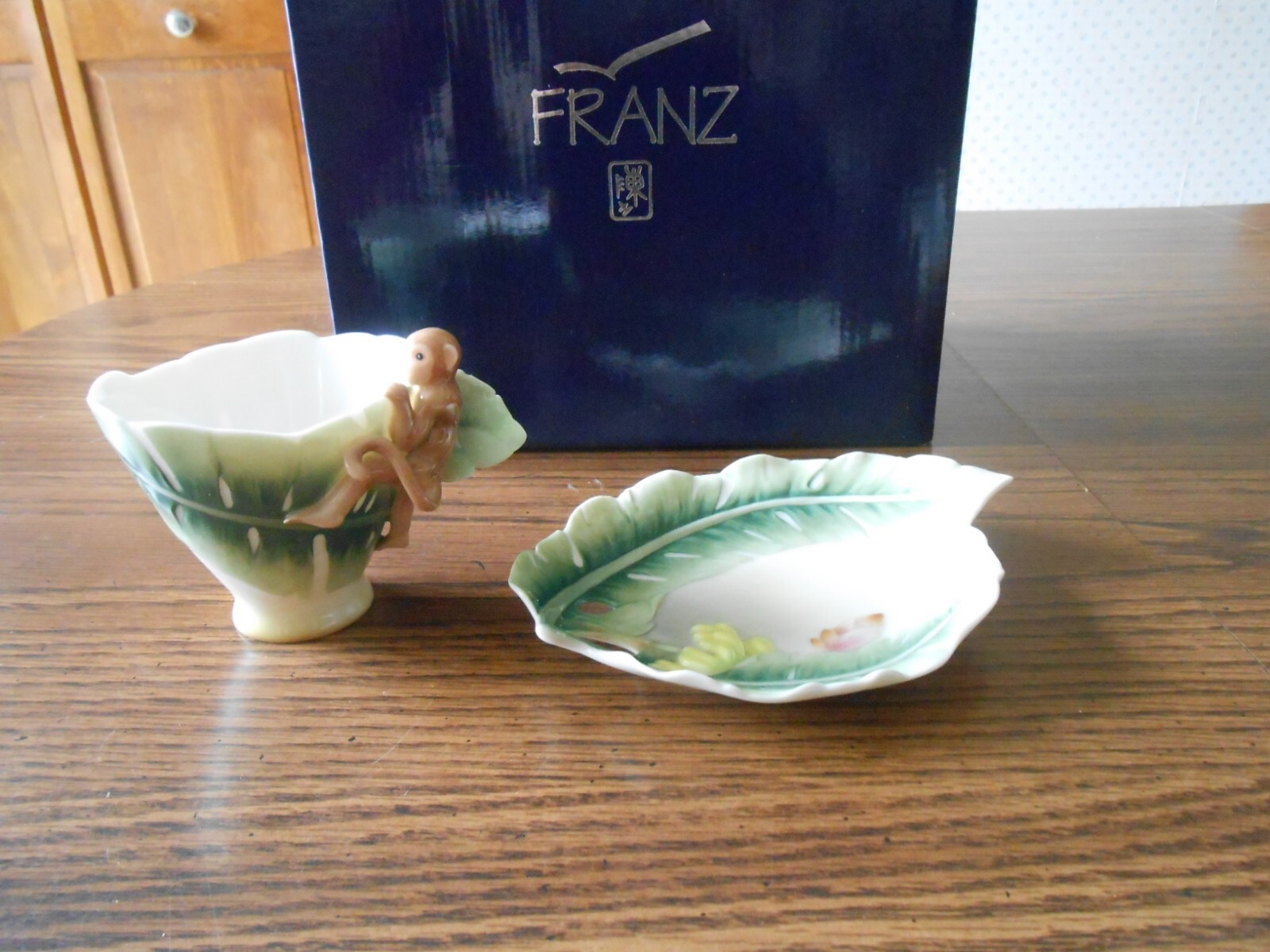 Franz Monkey porcelain cup, saucer (FZ00106) and spoon Franz Monkey porcelain cup, saucer (FZ00106) and spoon