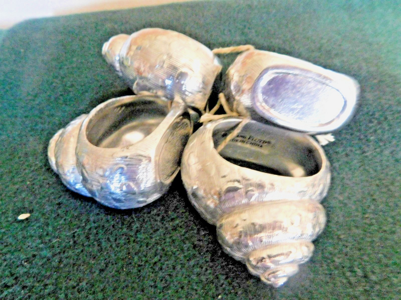aluminum Fitz and Floyd shell shaped napkin rings 4 of them Made in China