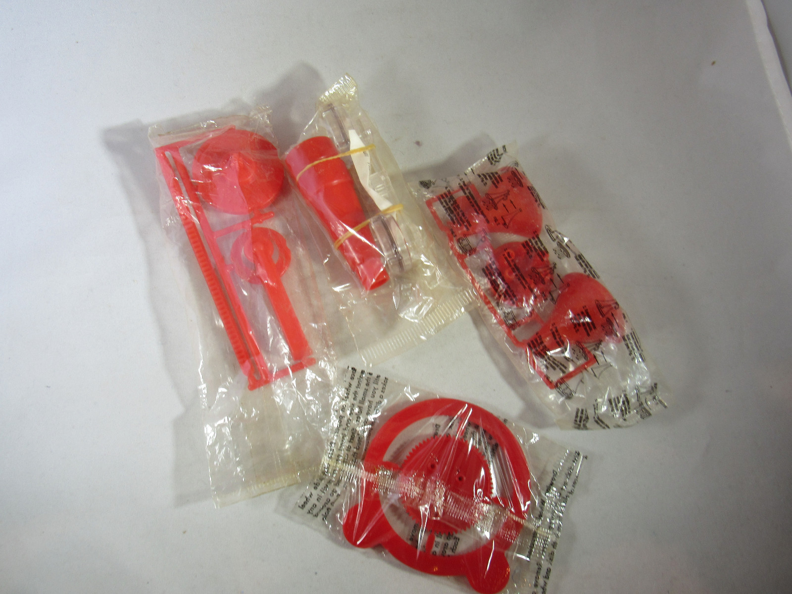 Cereal Premium Lot of 4 Assorted Red Toys in Sealed Bags Vintage Free Shipping