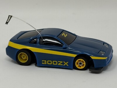 TYCO Nissan 300 ZX, Blue / Yellow Tyco Slotless Chassis NEW OLD STOCK WORKS!