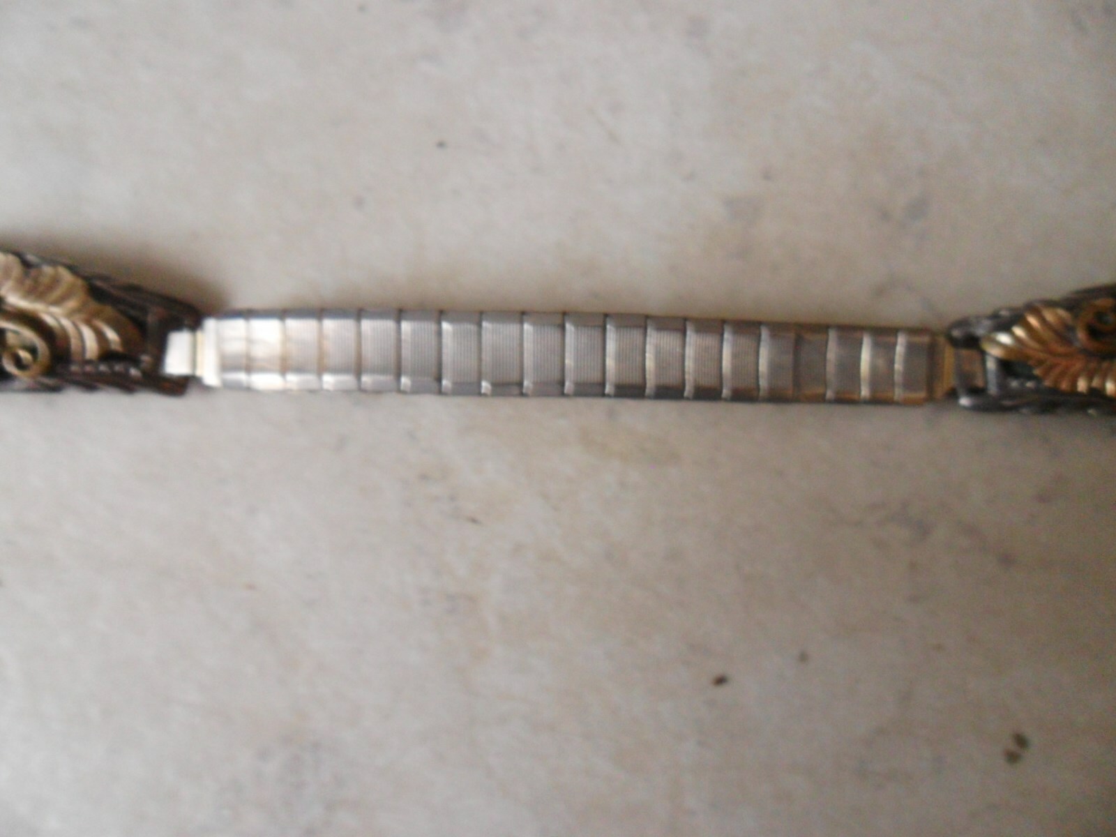 J.B. Sterling Eagle on Gold Colored Leaf Tips Ladies Watch Band