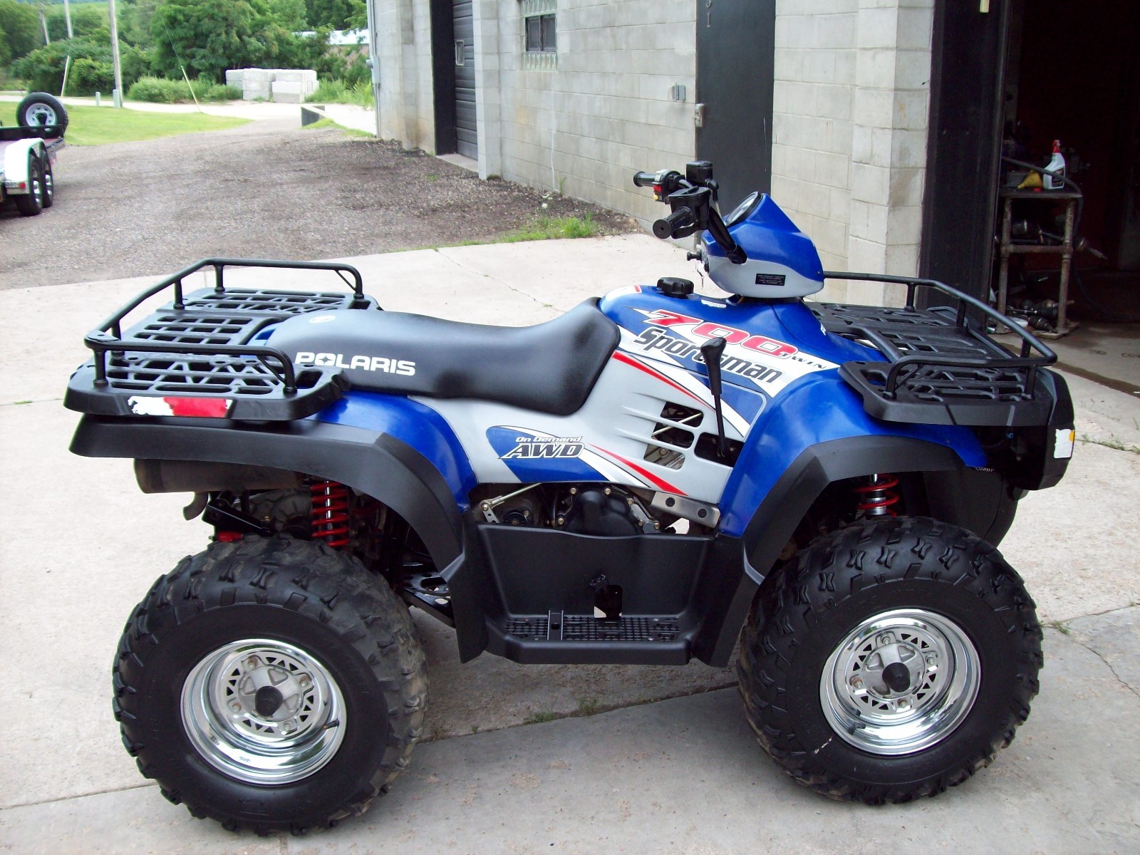 2004 Polaris Sportsman 700 Twin, 4x4, automatic, chrome wheels, rack extensions