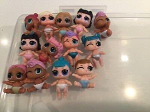 LOL Dolls - 23 dolls with accessories - $65 organiser box included