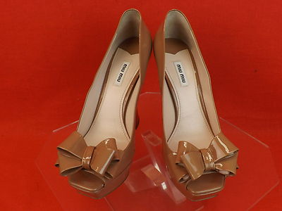 Pre-owned Prada Miu Miu  Caramel Patent Leather Bow Flared Heel Platform Pumps 41 In Nude/caramel