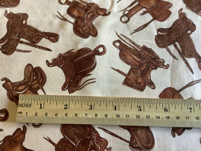 MODA Queen of the Ranch Western Fabric/ Tossed saddles on light Tan 2 yards
