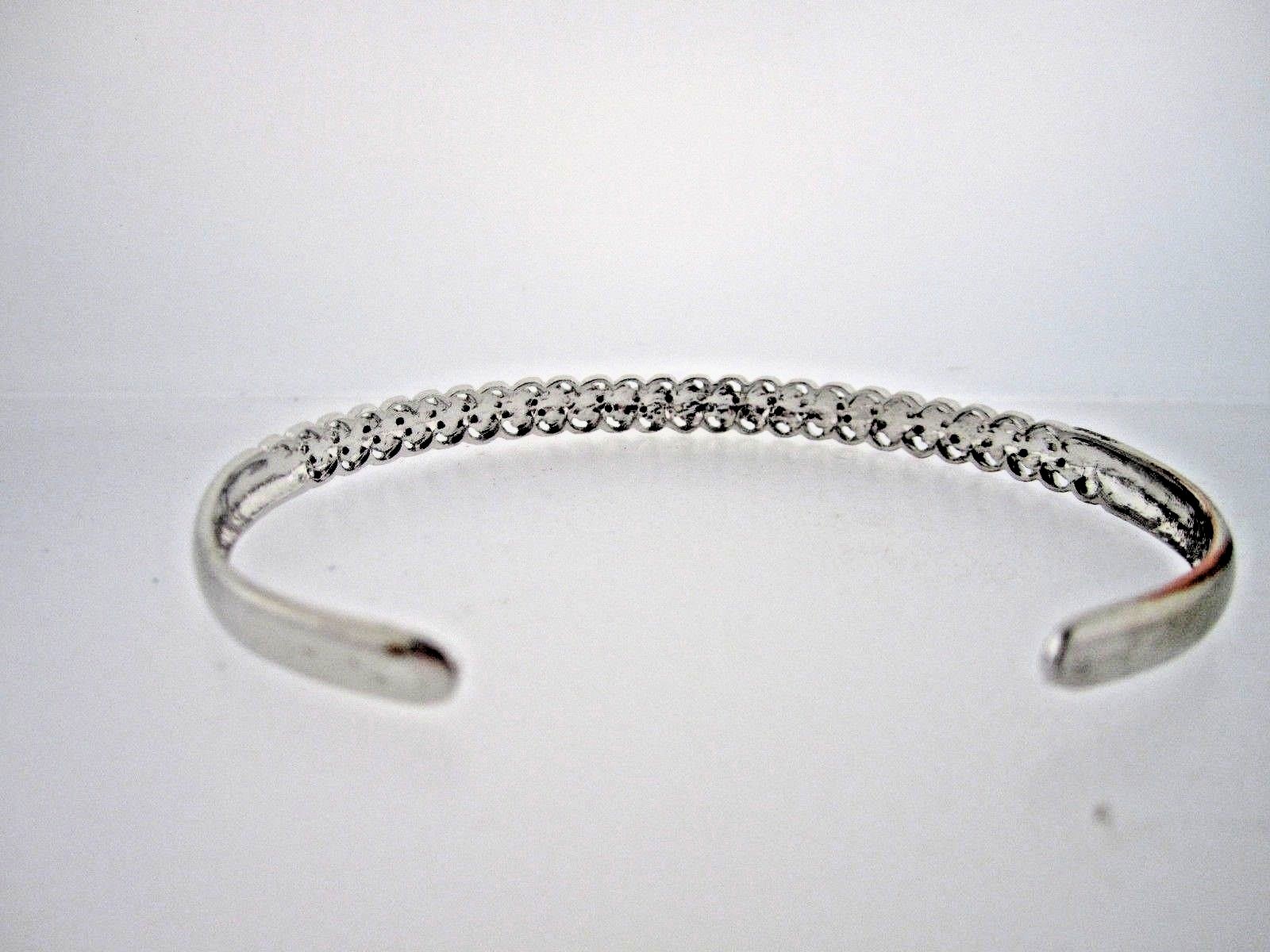 * .925 STERLING SILVER BANGLE  WITH 1 POINT DIAMOND AND LOOK OF DIAS THROUGHOUT