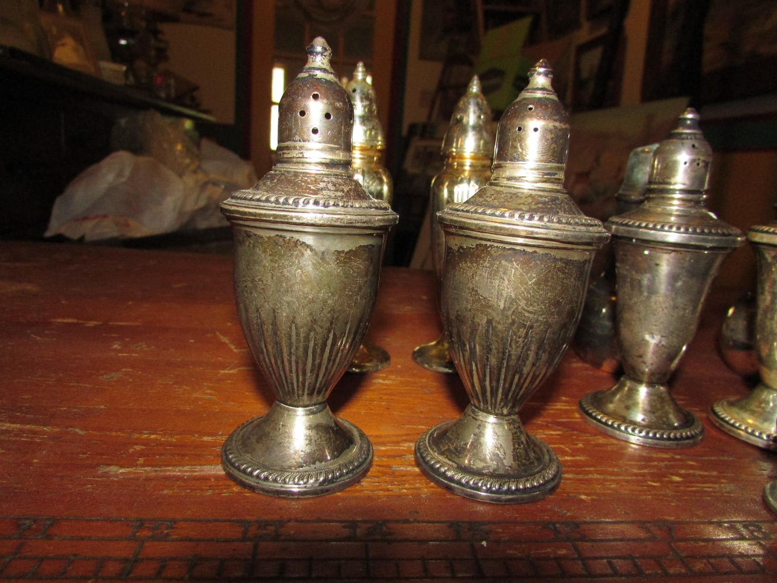 FIVE PAIR OF SALT AND PEPPER SHAKERS TWO STERLING