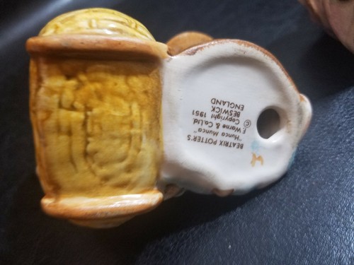 HUNCA MUNCA FIGURINE FROM BEATRIX POTTER COLLECTION and HUNCA MUNCA sweeping